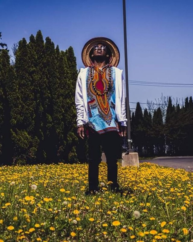 Dandelions and Man with a Mexican Hat